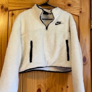 White and fluffy Nike crop sweater